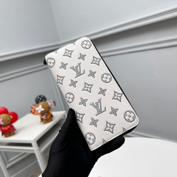 LOUIS VUITTON M83381 縦型ジッピー長財布 モノグラムシャドウ アイボリー サイズ:20x10cm LOUIS VUITTON M83381 縦型ジッピー長財布 モノグラムシャドウ アイボリー サイズ:20x10cm
