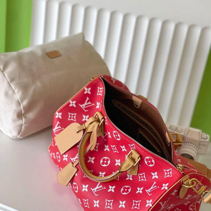 LOUIS VUITTON M24420 スピーディーP9 オールレザーまくらバッグ サイズ:40x26x23cm